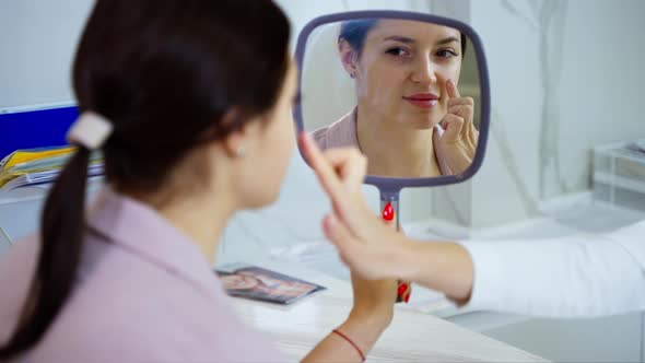 Cosmetological Clinic Adult Woman in Appointing with Aesthetician and Plastic Surgeon alt