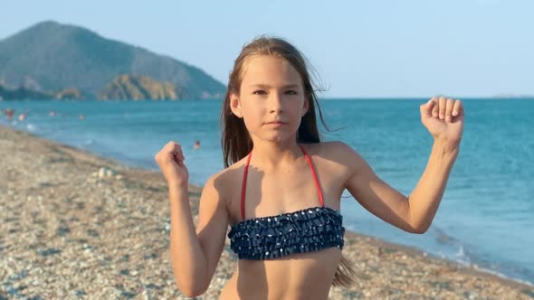 Young Girl Dancing Merry Dance on Sea Beach. Happy Child Having Fun on Beach, Stock Footage