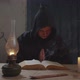 Monk with Bible Reading Prayer in Rustic House - VideoHive Item for Sale