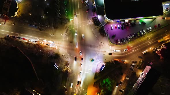 Night City Street Highway Intersection with Heavy Traffic
