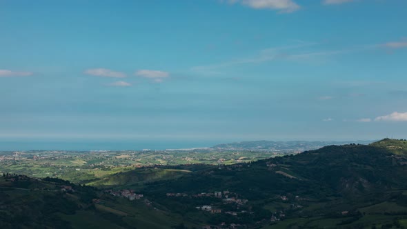 Time lapse looking out over San Marino towards the sea alt