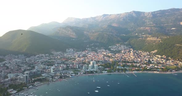 Aerial Panorama of Coast Line of Budva, Montenegro. Swallows Flies Close To Drone