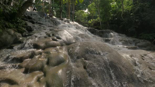 Water flowing at Dunn's River Falls in Jamaica alt