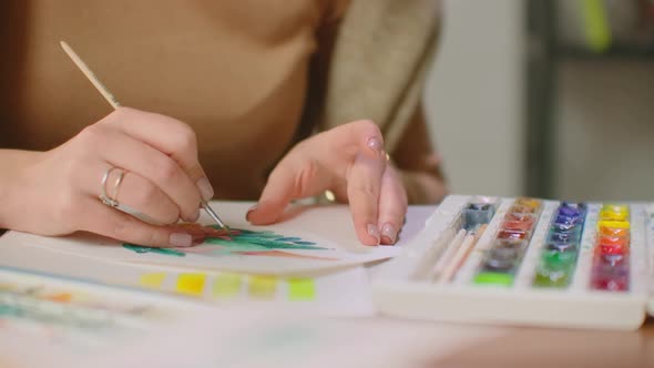 Young Graphic Designer Working on Modern Desktop Computer While Using Graphic Tablet at Desk in the alt