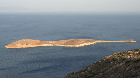 A Treeless Barren Small and Long Simple Island alt