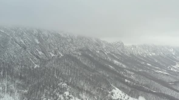 Veliki Krsh mountain ridge by winter 4K drone video