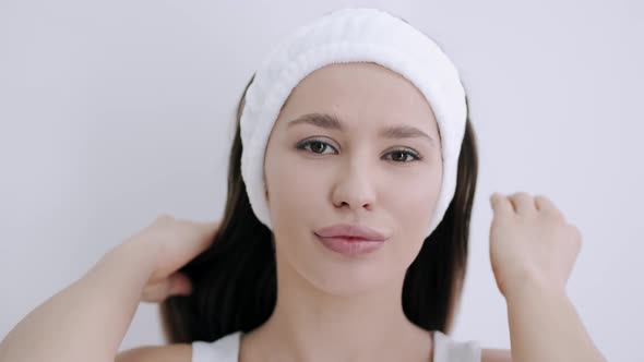 Portrait of Young Girl in White Hoop in Beauty Salon. alt