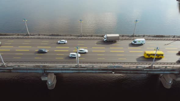Aerial View Car Traffic on River Bridge