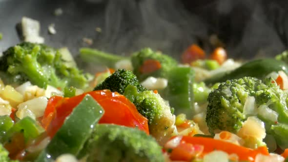 Lunch of Vegetables. Cook the Vegetable Stew in a Pan. Frozen Vegetables on a Salad. Semi-finished