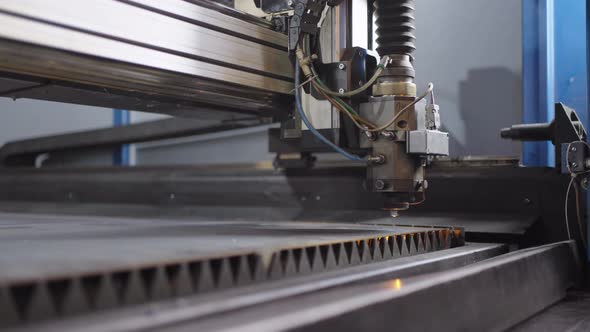 Industrial CNC Laser Cutting Machine Cuts Metal Sheet