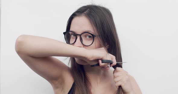 Woman Glasses Cuts Her Hair White Background