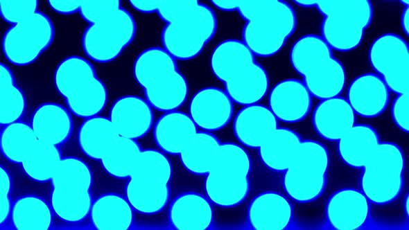 Defocused Pulsating Colorful Lights Bokeh Against Dark Background alt