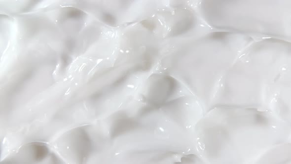 Motion of the Liquid Cream White Cosmetic Texture with Rotation alt
