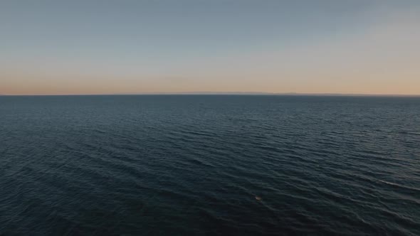 Waterscape with Deep Blue Sea at Sunset alt