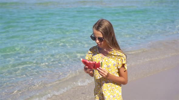 Happy Child on the Sea with Watermelon