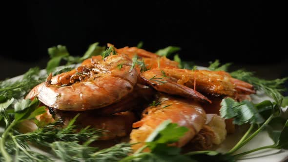Greenery Falls Onto Shrimps with Dill and Parsley on Plate alt