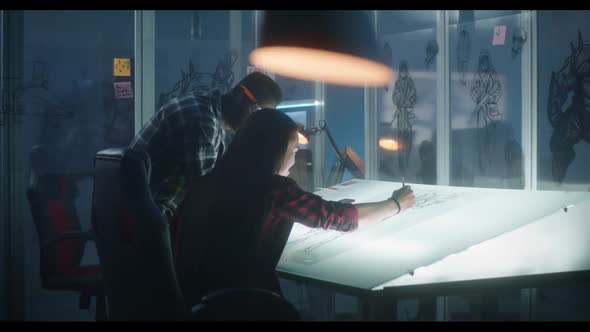 Graphic Designers Working on Video Game Concept Art alt