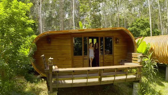 Attractive Girl Models Out From Their Capsule Like Room River View Resort alt