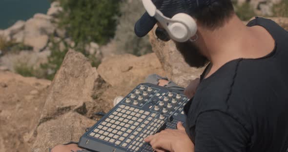 Disc Jockey Uses MIDI Pad alt
