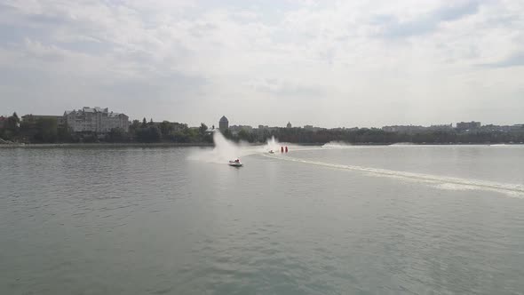 Boat racing aerial view alt