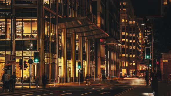 Busy city street at night time lapse