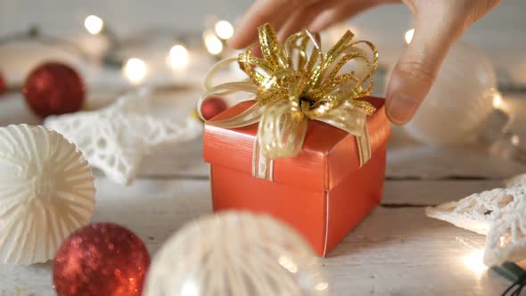Placing Christmas Gift Box alt