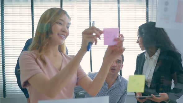 Group of young businessman and businesswoman people working in office. alt