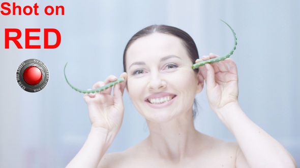 Woman with Aloe Vera Having Fun A Concept Of Organic Body Care  alt