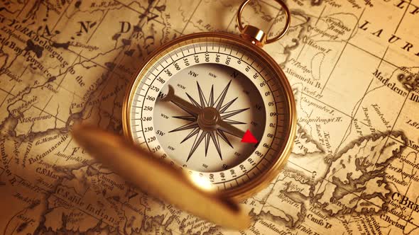 Golden Compass On The Old Map Indicating Direction alt