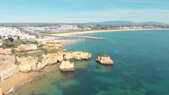 Wide view over Old Town Lagos and Coastline near Praia do Estudante, Algarve, Portugal alt