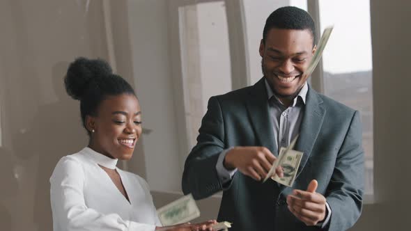 Ethnic Business Couple Celebrating Success alt