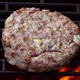 Top View of Halfprepared Burger Cutlet Made of Meat and Onions Roasting on Grill - VideoHive Item for Sale