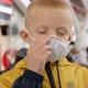 Closeup of a Small Boy in a Medical Mask in the Airport Waiting Room - VideoHive Item for Sale