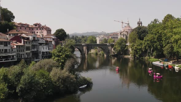 Picturesque Amarante city by the Tamega River. Fly over forward alt