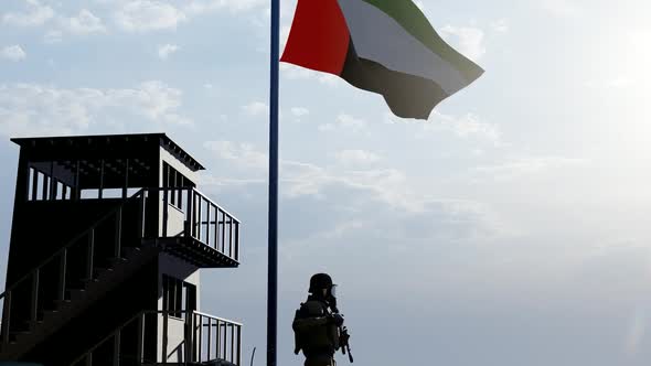 Soldier on Watch Under the Flag of the United Arab Emirates alt