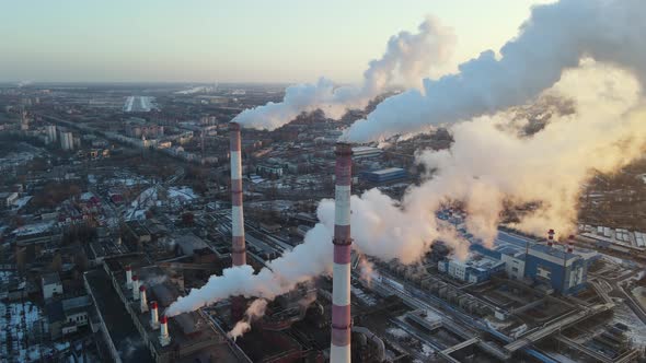 Industrial pipes factory pollution atmosphere, smokestack exhaust gases. alt