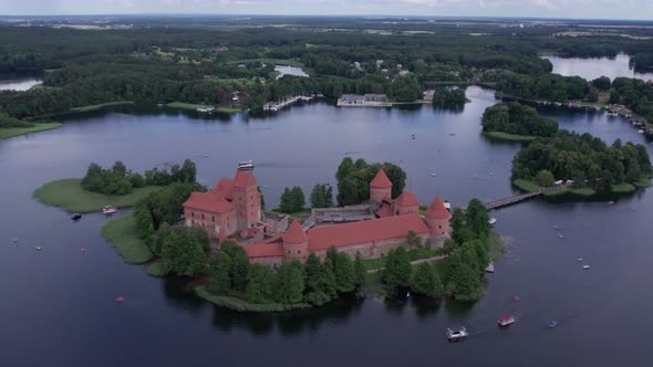 smooth aerial footage of the ancient Trakai castle on the island alt