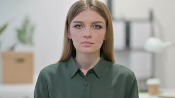 Young Woman Looking at Camera alt