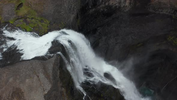 High Angle View of White Water Falling Into Depth alt