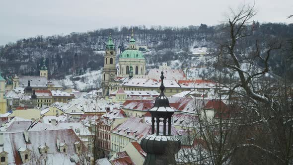 Snowy rooftops in Prague alt