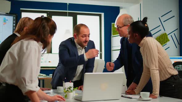 Diverse Businesspeople Working in Teamwork Discussing Project Strategy alt