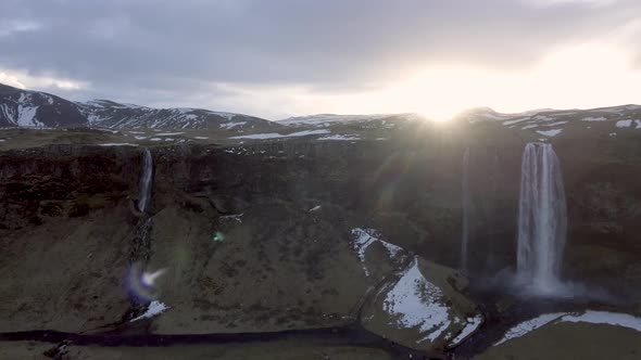Seljalandsfoss waterfall in Iceland aerial panoramic view at sunrise