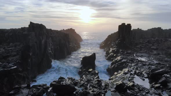 Dramatic Aerial View of Rocky Coast Wild Beach at the Bombo Headland Quarry Geological Site Australi alt