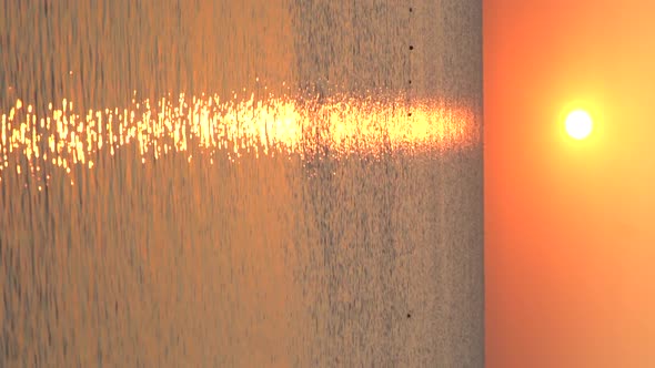 Beautiful Seascape Sun Over the Sea Near the Shore alt