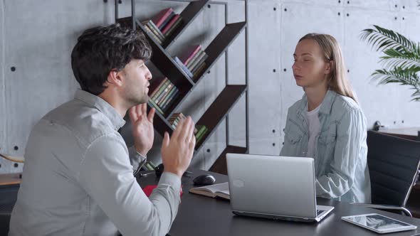 Human Resources Manager Conducting Job Interview with Applicant in Office alt
