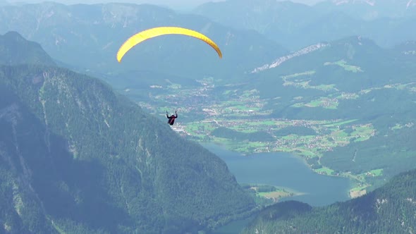 Paraglider Over the Summer Valley