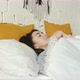 Portrait of Calm Asian Girl Lying Down in Bed and Napping in Cozy Apartment - VideoHive Item for Sale