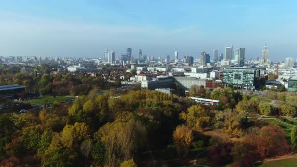 Aerial of Warsaws skyline over urban greenery area and vibrant city, near Centrum Informatyki Statys alt