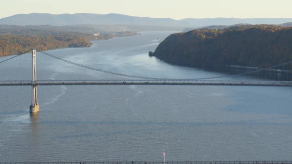 Aerial of walkway and Mid-Hudson Bridge over Hudson river alt