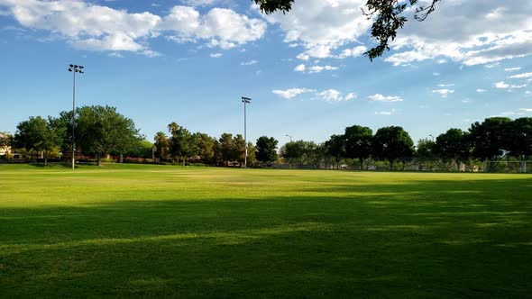 City park panorama reveals mountain background in a suburban community alt